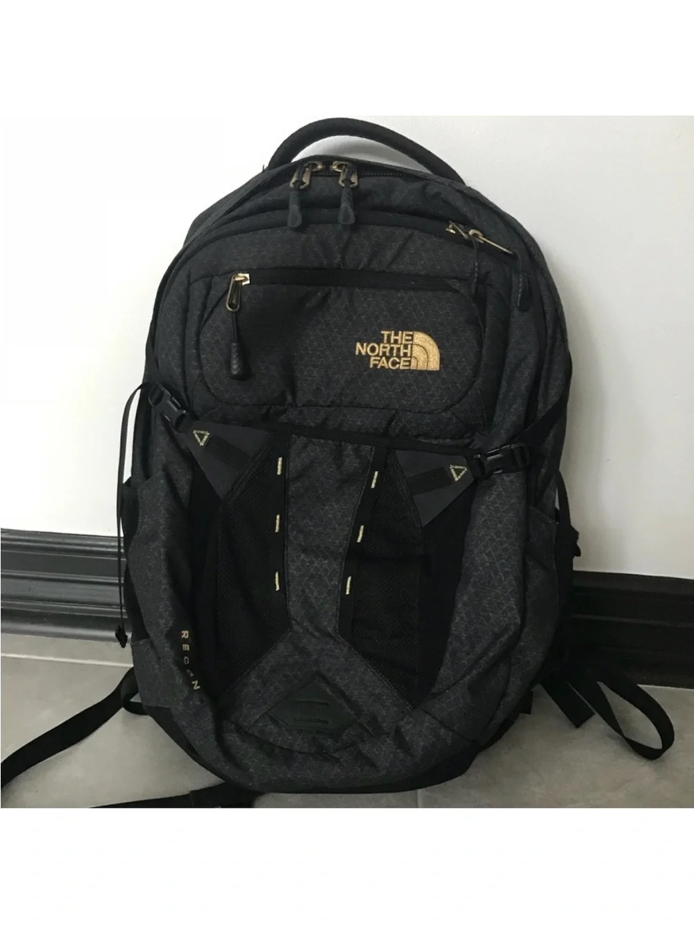 The North Face Black Backpack with Gold Accents Women’s